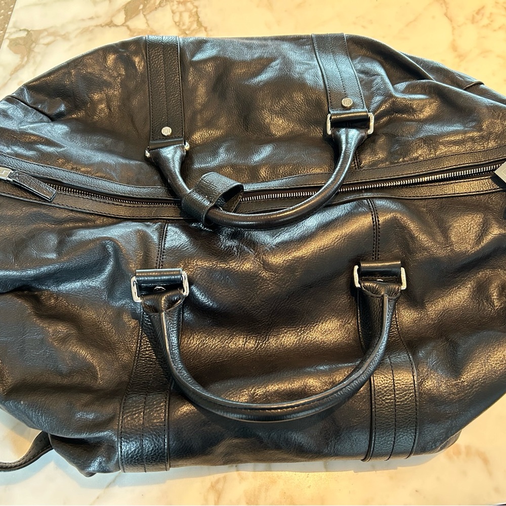 Lambertson Truex weekend bag. Great condition. Clean With keys & dust bag.